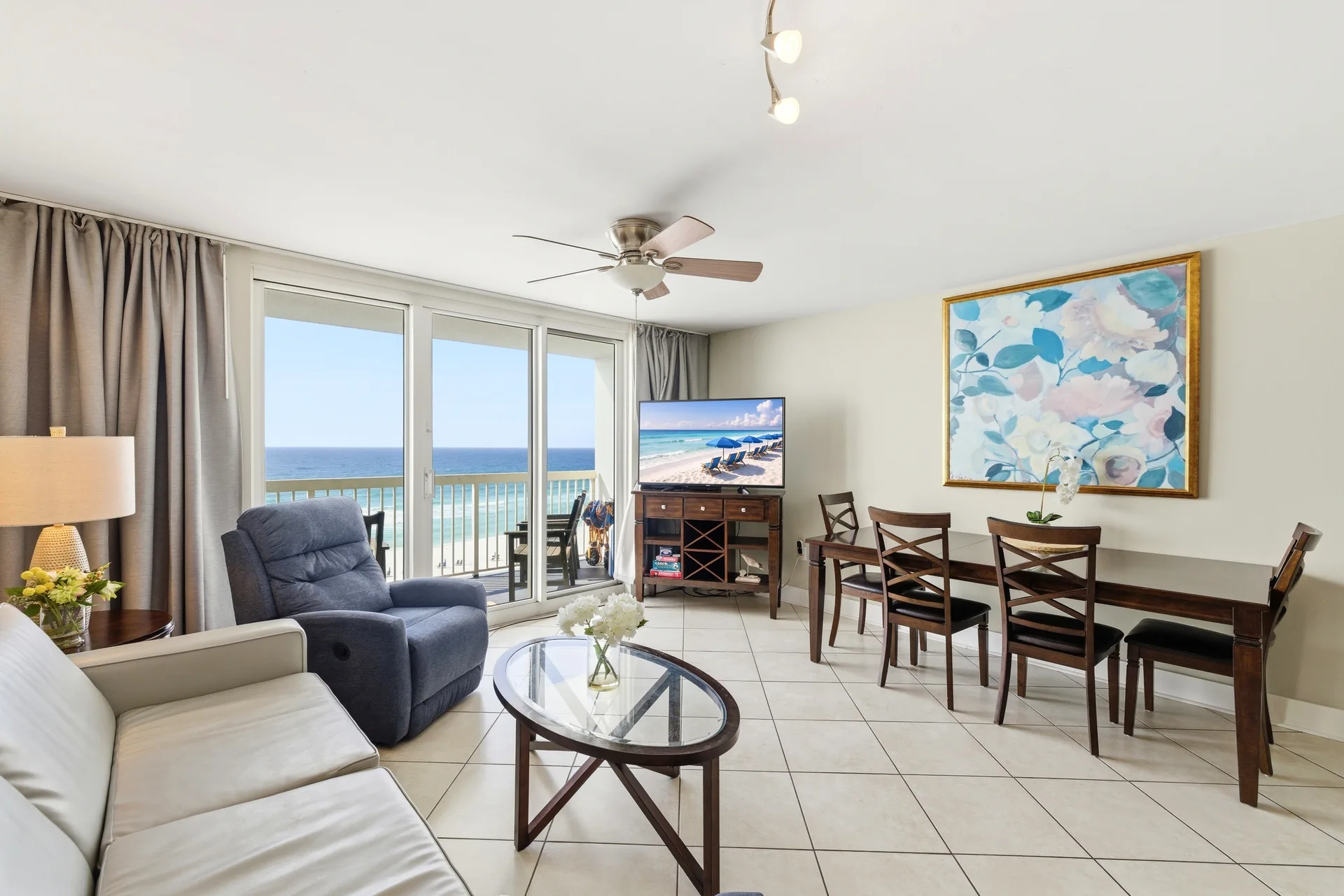 Unit 707 living and dining room with floor-to-ceiling Gulf views