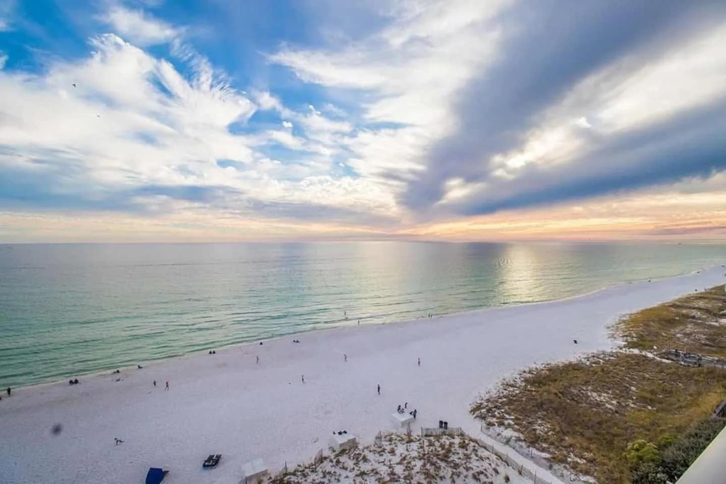 Sunset over the Gulf and white-sand beach from the Unit 707 balcony