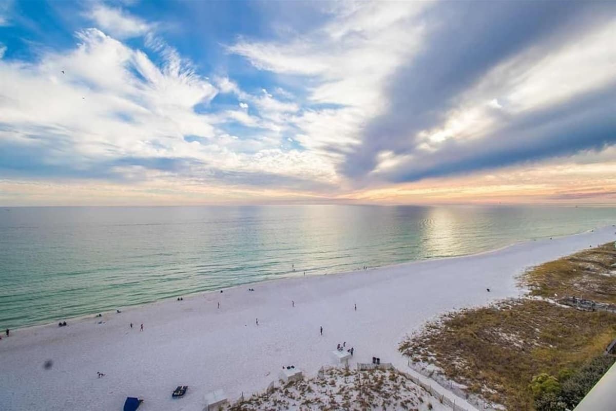 White-sand beachfront at Pelican Beach Resort in Destin