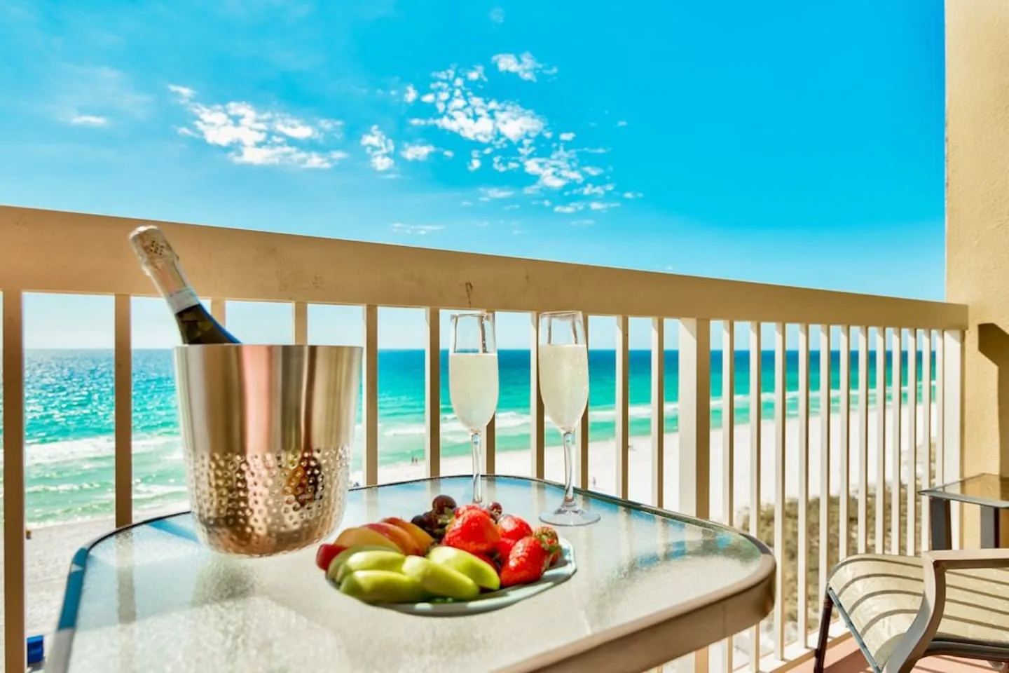 Private seventh-floor balcony set for two above the Gulf at Unit 707