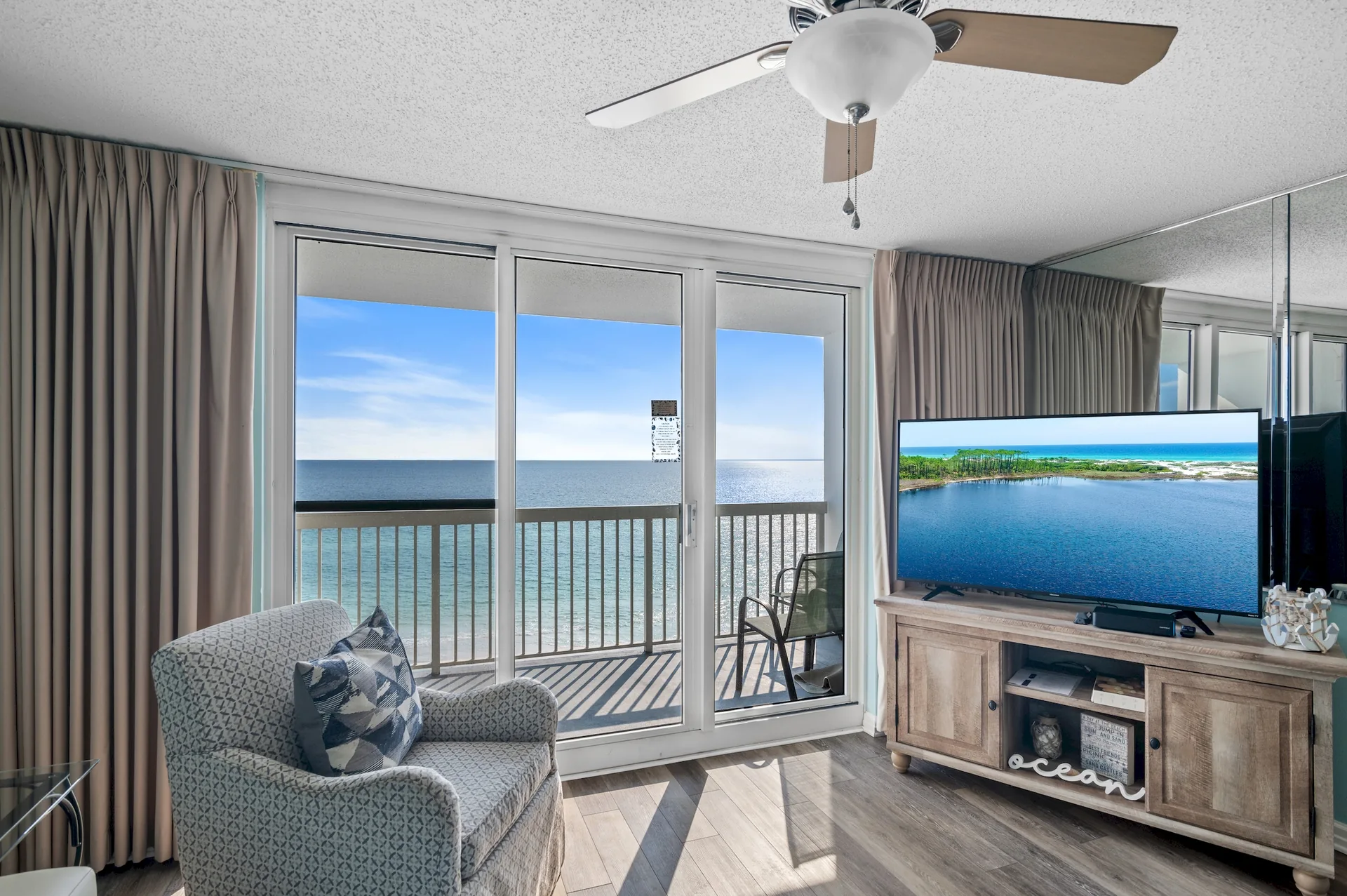 Panoramic Gulf view visible on arrival inside Pelican Beach Resort Unit 1006